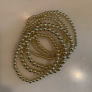 E Newton DUPE gold bracelets